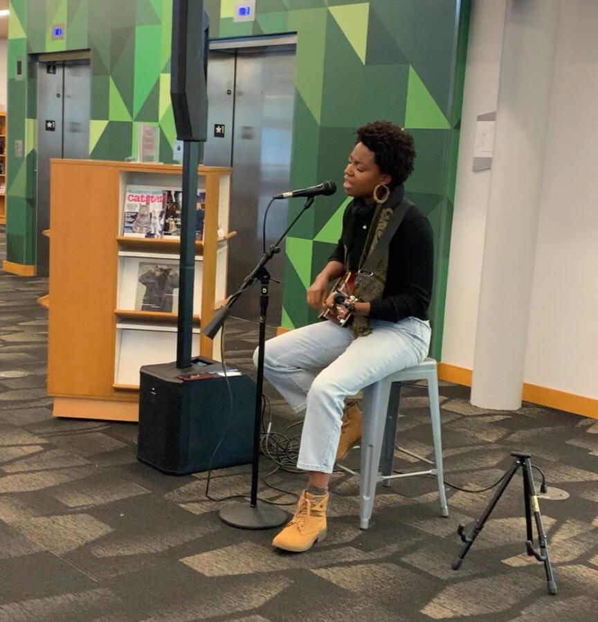 Singer-songwriter Anna Marie performing at Dayton Public Library