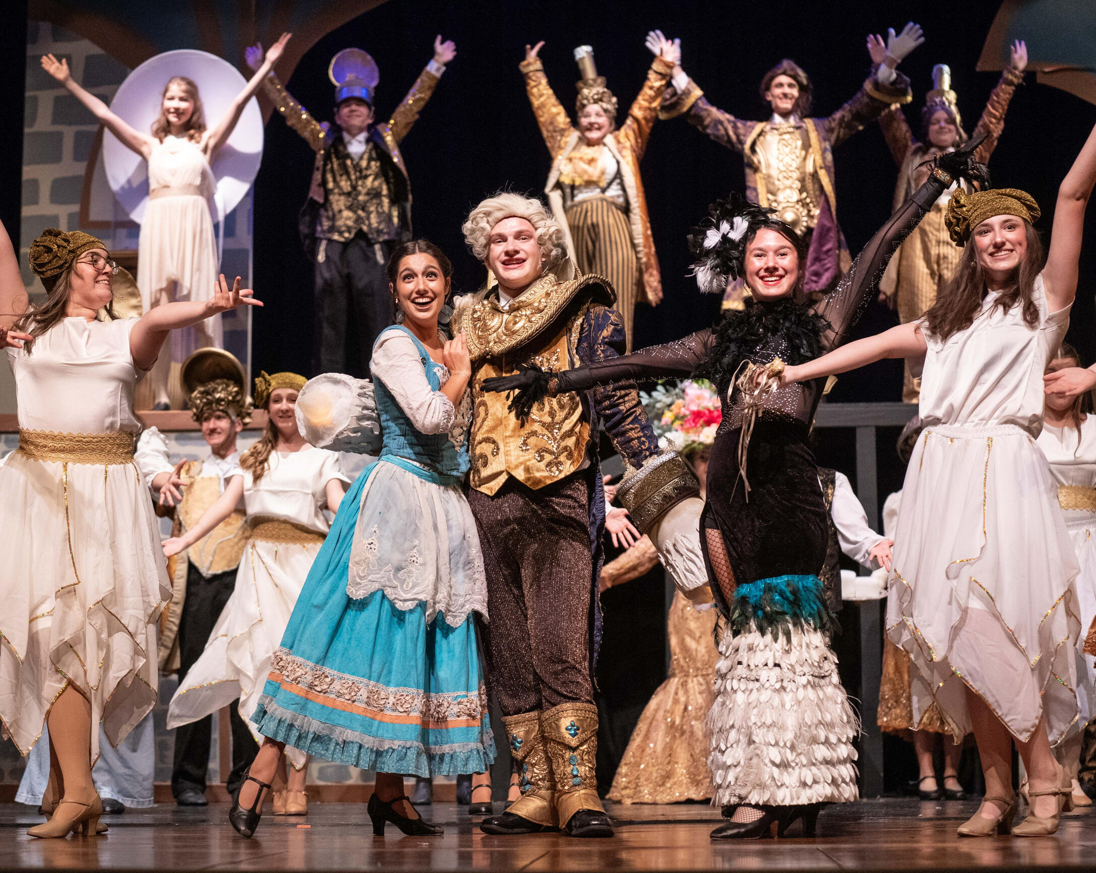 Vandalia Youth Theatre Company Vandalia Youth Theatre Company cast in costume, on stage, and smiling for audience